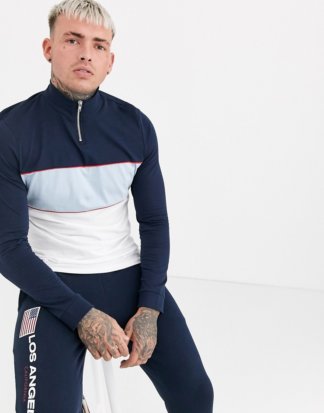 ASOS DESIGN - Langärmliges Shirt aus Bio-Material mit Reißverschluss-Stehkragen und marineblauem Farbblockdesign-Navy