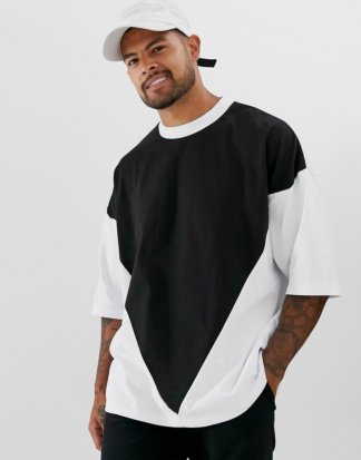 ASOS DESIGN - Schweres Oversized-T-Shirt mit halblangen Ärmeln und dreieckigem Farb-Print-Schwarz