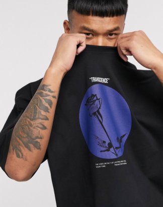 ASOS DESIGN - Übergroßes T-Shirt mit kontrastierendem Kreis- und Blumenprint in Schwarz