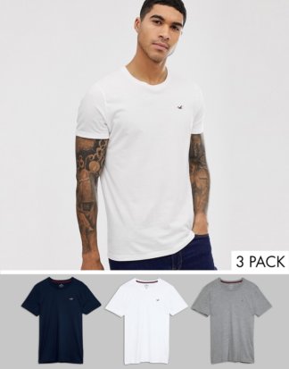 Hollister - Schmal geschnittene T-Shirts mit Rundhalsausschnitt und Seemöwen-Logo im 3er-Pack, weiß/grau/marineblau-Mehrfarbig