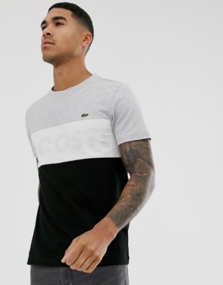 Lacoste - T-Shirt in Grau und Schwarz mit zusammengesetzten Bahnen und Brustlogo