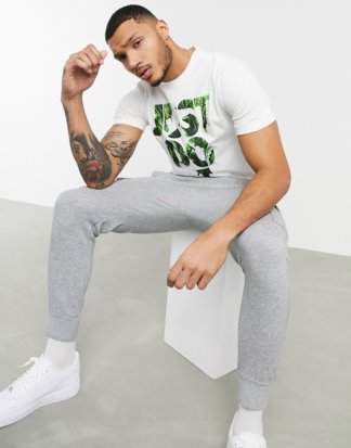 Nike - Weißes T-Shirt mit Just Do It-Logo
