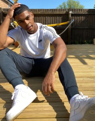 Nike - Weißes T-Shirt mit Logoband