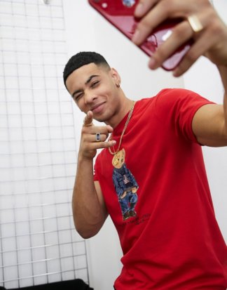 Polo Ralph Lauren - Rotes T-Shirt mit einem Bären in Jeans bedruckt